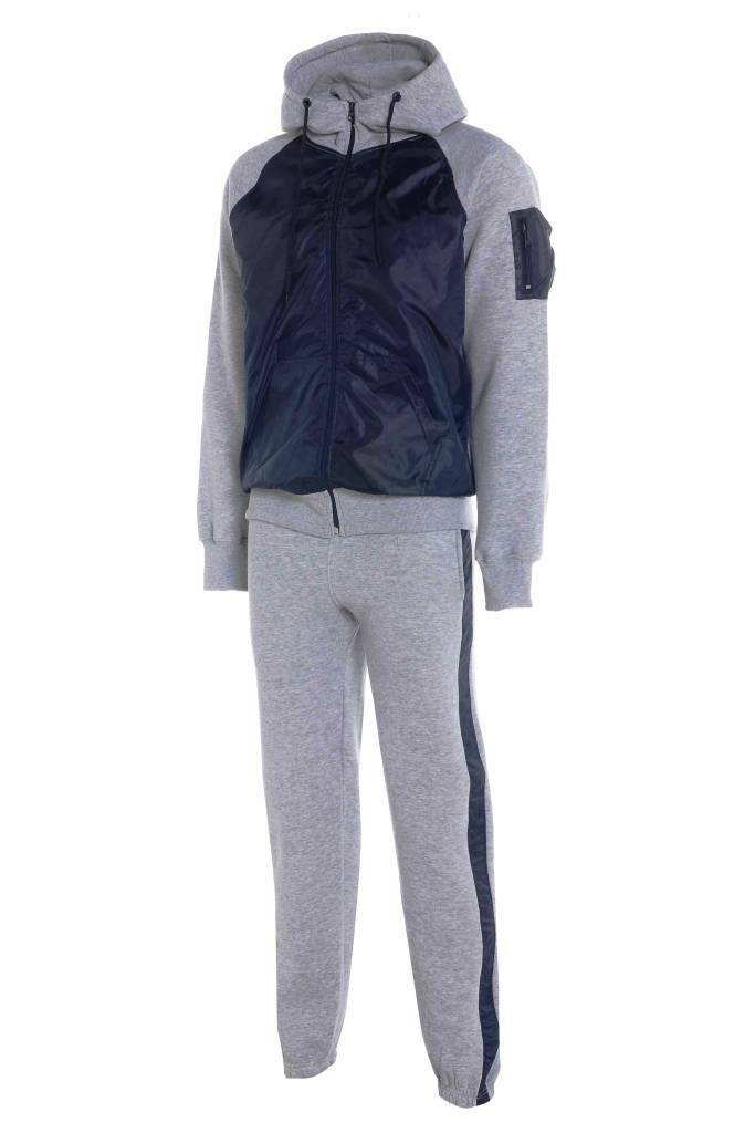 Boys Shell Tracksuits. These Are Available In Silver Grey 7 Navy. They Have A Pocket On The Sleeve, Elasticated Ribbed Waist Band & Front Zip. The Hood Has A Drawstring Option To Make It Tighter On The Cooler Days. The matching Jogging Bottoms Have Elasticated Waist & Ankles.Available In Ages 7-13.
